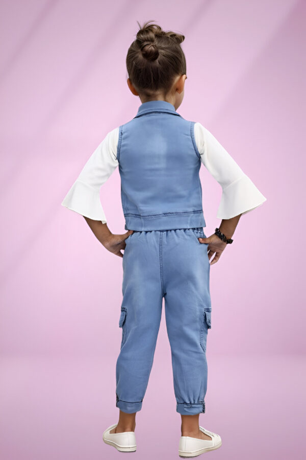 a girl in a blue vest and white shirt